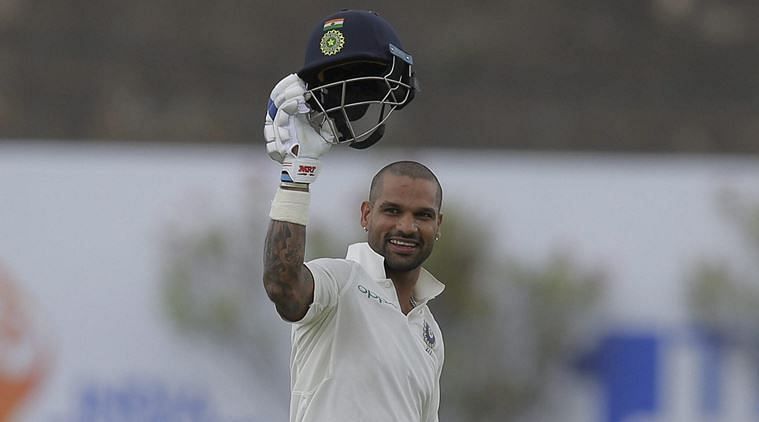 Dhawan acknowledges the cheers.